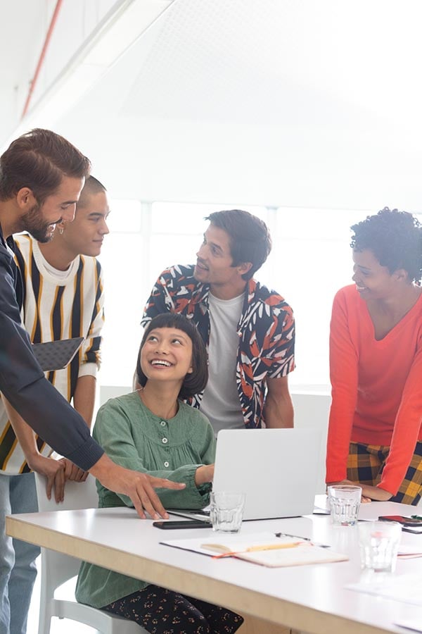 front-view-of-diverse-business-people-discussing-o-UTZ9W3S